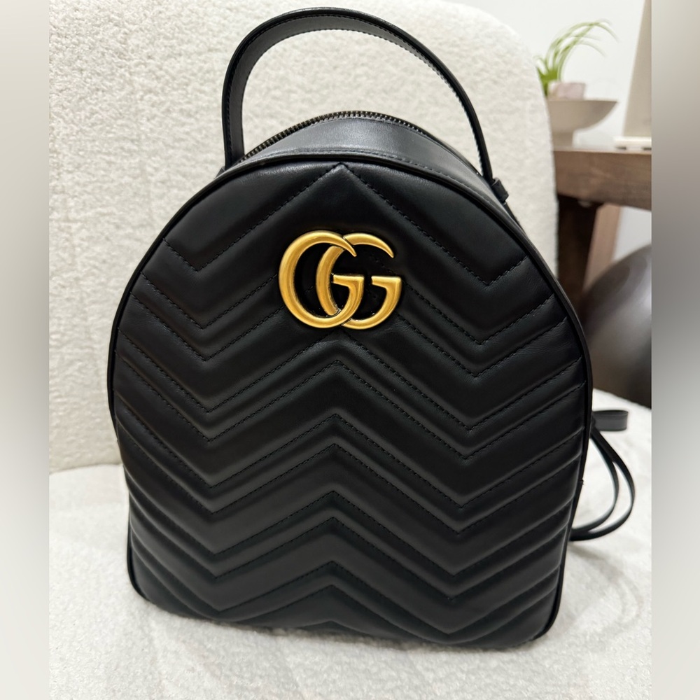 Gucci Black Backpack with Gold Logo